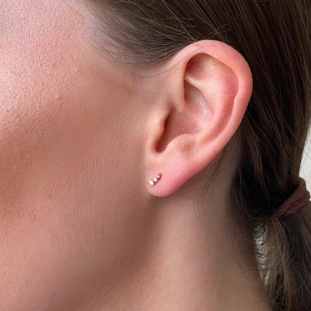 18ct Gold Plated Dainty Three Stone Stud Earrings | Irya - Image 2
